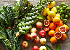 a group of fruits and vegetables on a wood surface Healthy Weight Loss Diets Sleaford